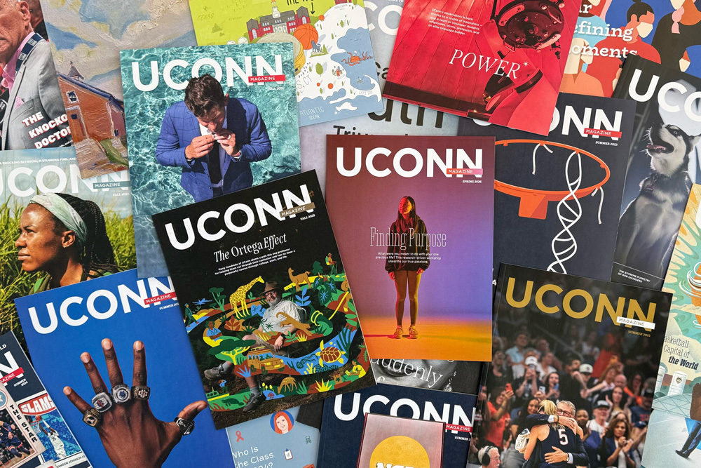 A spread of UConn magazines overlapping